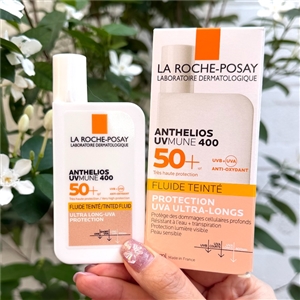 กล่องแบน/สีเนื้อ La Roche Posay Anthelios UVmune 400 Tinted Fluid SPF50+ 50ml.