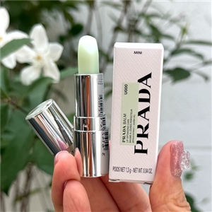 Prada Lip Optimizing Care 1.3g. สี U000 Universal
